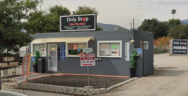 Only Stop storefront at 461 Woodbury Road, Altadena. Gray block building with white awning and "Only Stop" sign listing services: Mail boxes, Live Scan, Notary, Passport Photo, Breathalyzer, Registration Service. Phone 626-790-3010.